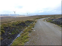 NH5914 : Access track above Corriegarth windfarm by Richard Law