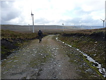 NH5814 : Riding down to the Corriegarth turbines by Richard Law