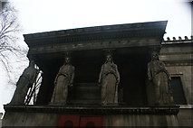 TQ2982 : View of four statues on the side of St. Pancras Church from Euston Road by Robert Lamb