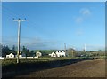 Lane leading from the A25 to modern houses at Tullymurry