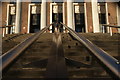 Looking up the handrails of the steps leading up into Waltham Forest College