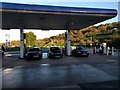 Service station, with cars at the petrol pumps