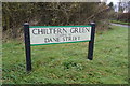 TL1319 : Chiltern Green sign by Geographer