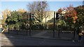 View of "WOODSIDE" painted on the railings of The Woodside School from Wood Street