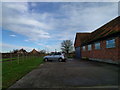 Car parked outside industrial units