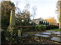 Churchyard monument and Ebor House