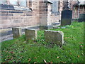 5 old headstones east of the south porch