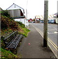 Roadside bench near a Williamstown boundary sign