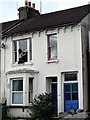 Painting the window, Harold Road, Hastings