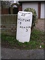 Old Milestone by the former A33 at Three Mile Cross