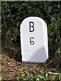 SX0674 : Old Milestone by the B3266, south of Bravery Cottages by Ian Thompson