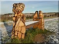 Owls and squirrel wood sculpture