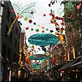 TQ2981 : Carnaby Street Christmas decorations 2017 by Oast House Archive