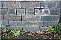 Benchmark on wall of former railway viaduct, Bestwood Road