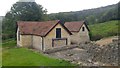 SO8914 : Modern building protecting remains at the bathhouse - Great Witcombe Roman Villa, Gloucestershire by Phil Champion