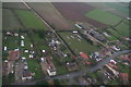 Windmill tower and A1104 through Maltby le Marsh: aerial 2018