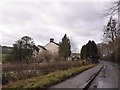 Footpath sign east of Rockstowes, Uley