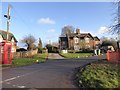 Semi-detached houses in Ham, by village green