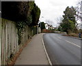 Wooden fencing alongside a bend in Cherry Orchard Road, Lisvane, Cardiff