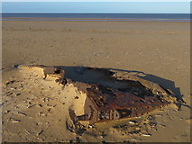 TF7544 : Army tank rusting on Titchwell beach in Norfolk by Richard Humphrey