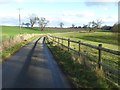 Road passing through former parkland at Eywood