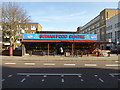 Street scene on Stoke Newington Road at the Sirwan Food Centre