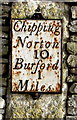 Old milestone in a Fulbrook wall, West Oxfordshire