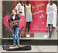 Busker outside M&S