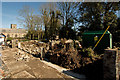 Re-building a stone wall at St. Peter