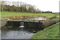 Weir and stepping stones on the balancing lake