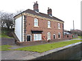 Cottage(s) immediately north of the top lock