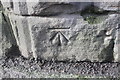 Benchmark on railway bridge at north end of Park Lane