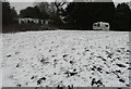 Derelict cabins and a caravan