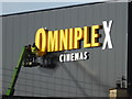 Fitting lettering, Omniplex Cinemas building, Omagh