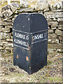 Cast iron milepost on the B6295 north of Cowshill