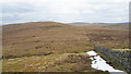 NY6445 : Fence and wall line along moorland ridge by Trevor Littlewood