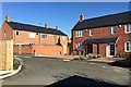 New terraced houses in Saw Mill Close, off Cherry Street, Coten End, Warwick