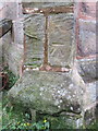 Bench mark on Holy Cross church, Woodchurch