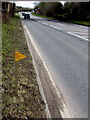 Yellow marker alongside the A419 Bristol Road, Stonehouse