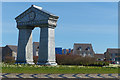 Clock arch on a roundabout, Glan Llyn, Newport