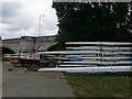 Skiffs beside Chiswick Bridge