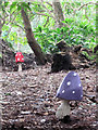 SX7384 : Wooden Toadstools in the wood at Bovey Castle by Chris Reynolds