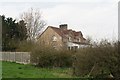 Magpie Cottages on road junction north of Oasby