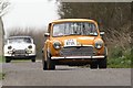 Classic cars driving through Braythorne