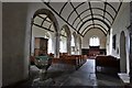 SX3880 : Bradstone: St. Nonna's Church: The c12th nave with c13th font by Michael Garlick