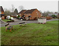 Two benches on a green, New Inn