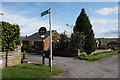 SE2923 : Finger post on Brandy Carr Road, Kirkhamgate by Ian S