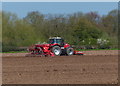 Tractor and farmland near at Lapley