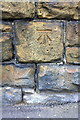 Benchmark on wall of Richardshaw Lane opposite Varley Street