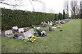 Memorials along the hedge